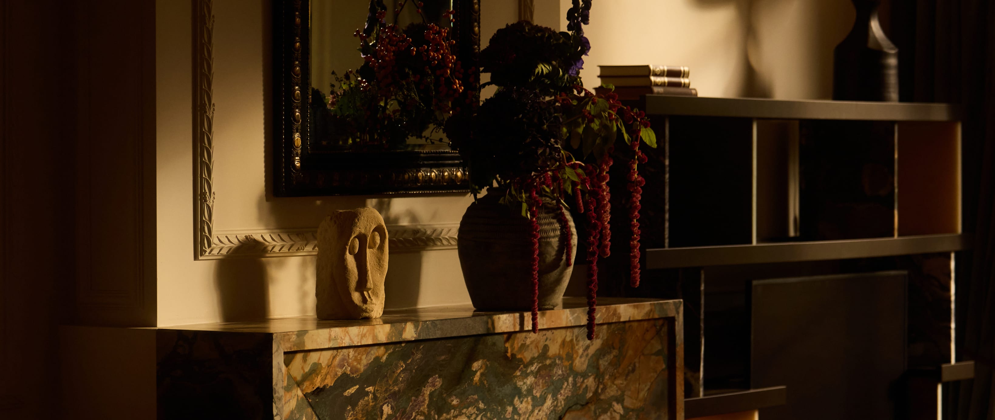 Candlelit interior with marble fireplace